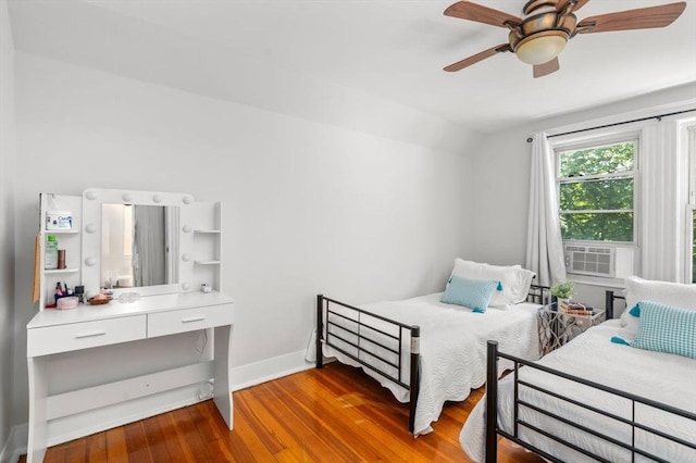 91 Freeman St, Newton, MA 02466 - bedroom featuring vaulted ceiling, cooling unit, wood finished floors, and a ceiling fan