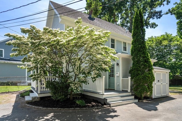 91 Freeman St, Newton, MA 02466 - view of front of property with a shingled roof