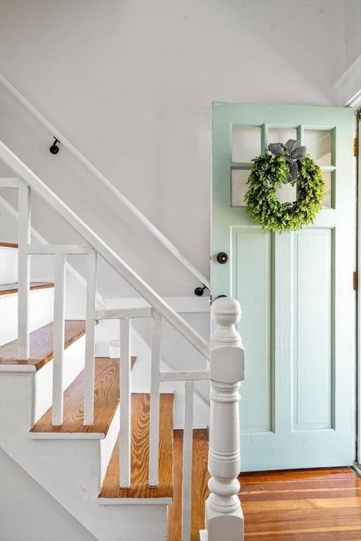 91 Freeman St, Newton, MA 02466 - stairway with wood finished floors