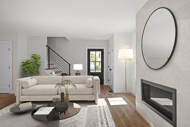 living room with light hardwood / wood-style floors