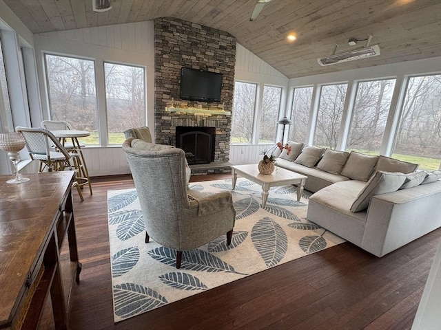 84 Bruce Rd, Concord, MA 01742 - living area featuring vaulted ceiling, wood finished floors, wood ceiling, plenty of natural light, and a stone fireplace