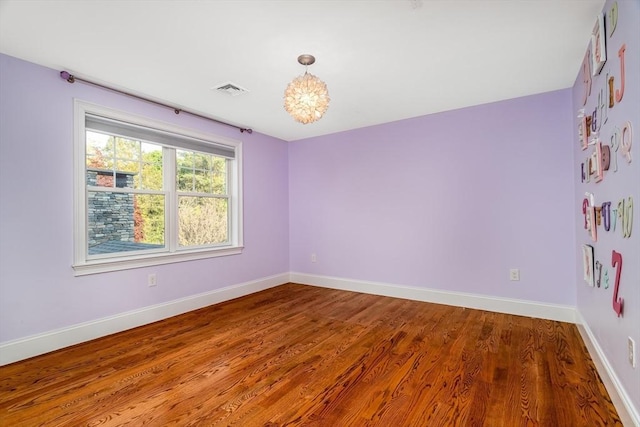 84 Bruce Rd, Concord, MA 01742 - spare room featuring baseboards and wood finished floors