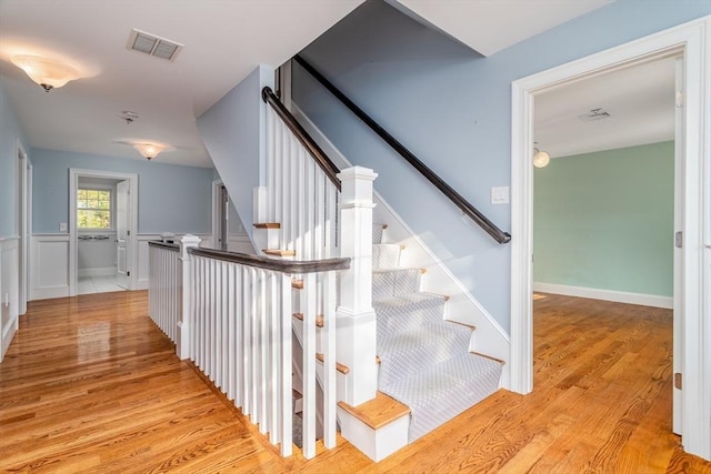84 Bruce Rd, Concord, MA 01742 - staircase with wood finished floors