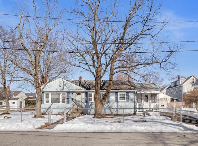 view of front of property with a fenced front yard and a residential view