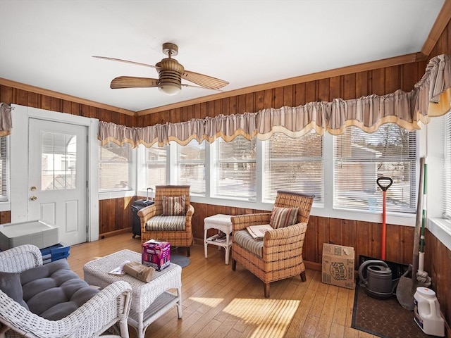 sunroom / solarium with ceiling fan