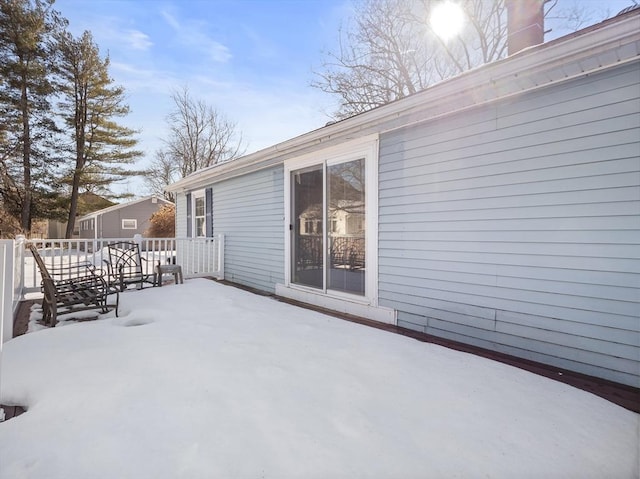 view of snow covered patio