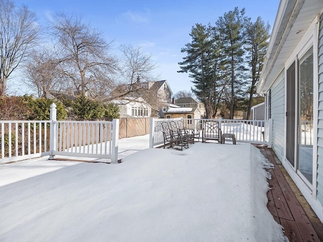 view of snow covered patio