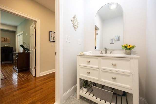 977 E St, Wrentham, MA 02093 - bathroom with wood finished floors and vanity