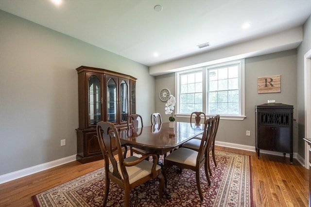 977 E St, Wrentham, MA 02093 - dining space with light wood-style floors and recessed lighting
