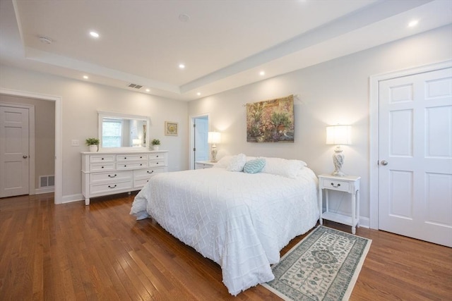 977 E St, Wrentham, MA 02093 - bedroom with a raised ceiling, wood finished floors, and recessed lighting