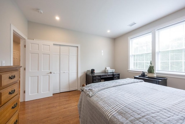 977 E St, Wrentham, MA 02093 - bedroom with light wood-style flooring, a closet, and recessed lighting