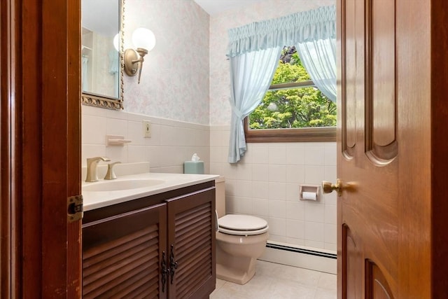 24 Flume Rd, Gloucester, MA 01930 - half bath with baseboard heating, wallpapered walls, toilet, vanity, and tile walls