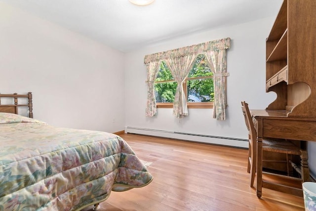 24 Flume Rd, Gloucester, MA 01930 - bedroom with a baseboard radiator and light wood-style flooring