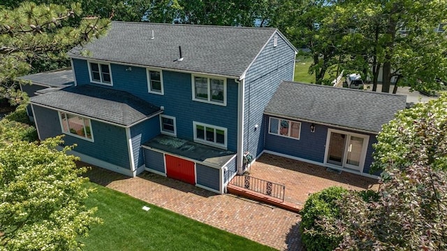 24 Flume Rd, Gloucester, MA 01930 - back of house featuring a wooden deck, a shingled roof, a lawn, and view of scattered trees