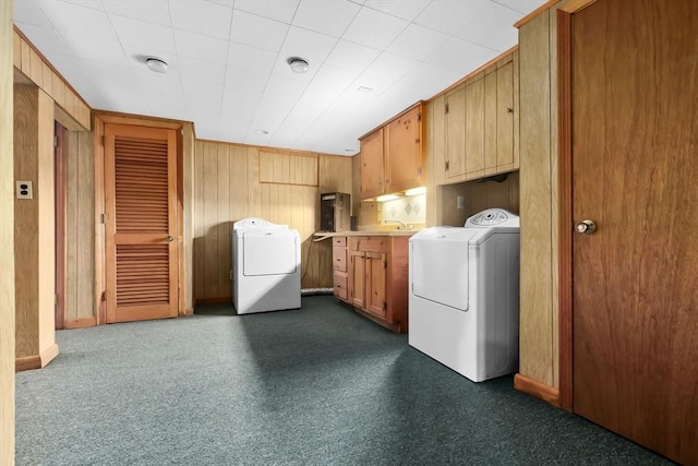 24 Flume Rd, Gloucester, MA 01930 - laundry room featuring cabinet space, dark colored carpet, and wood walls
