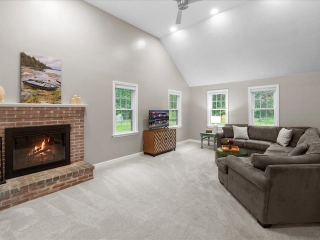 41 Nancy Dr, Ashland, MA 01721 - carpeted living area with ceiling fan, a fireplace, and high vaulted ceiling