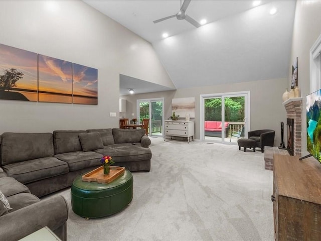 41 Nancy Dr, Ashland, MA 01721 - carpeted living area featuring ceiling fan, high vaulted ceiling, and a brick fireplace