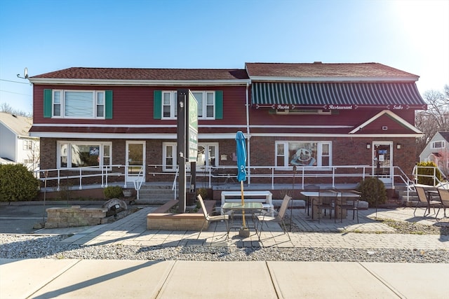 view of front of home with a patio area