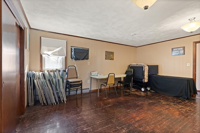 living area featuring dark hardwood / wood-style flooring and crown molding