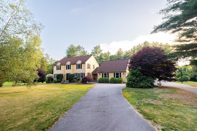 90 Braley Rd, Freetown, MA 02717 - colonial house with a front yard and asphalt driveway