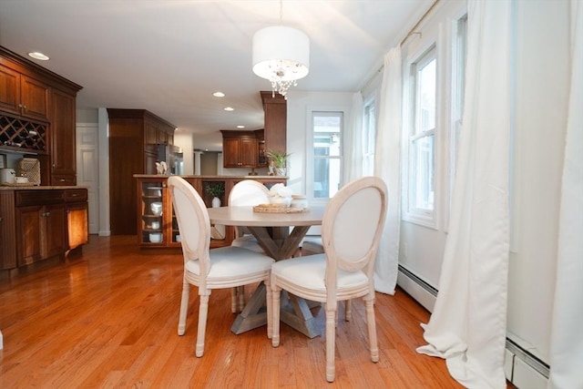 90 Braley Rd, Freetown, MA 02717 - dining area featuring baseboard heating, light wood-type flooring, and recessed lighting
