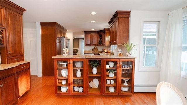 90 Braley Rd, Freetown, MA 02717 - kitchen featuring freestanding refrigerator, light wood finished floors, glass insert cabinets, light stone counters, and recessed lighting