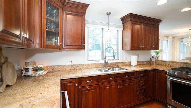 90 Braley Rd, Freetown, MA 02717 - kitchen featuring stainless steel range, pendant lighting, glass insert cabinets, light stone counters, and recessed lighting