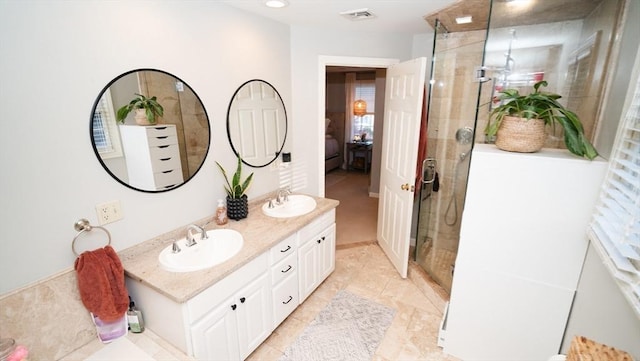 90 Braley Rd, Freetown, MA 02717 - bathroom featuring double vanity and a shower stall