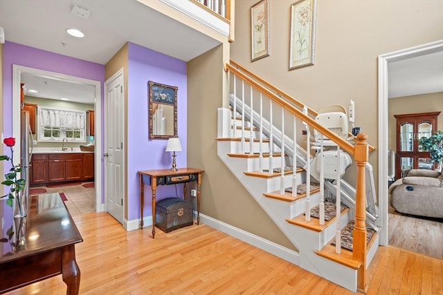 1 Cottonwood Cir, Kingston, NH 03848 - staircase with wood finished floors, baseboards, and recessed lighting