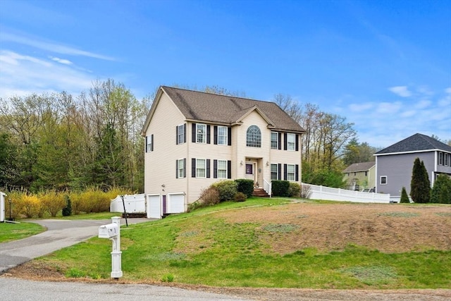 1 Cottonwood Cir, Kingston, NH 03848 - colonial house with an attached garage and asphalt driveway