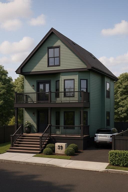 39 Rogers Ave, Somerville, MA 02144 - view of front of house with a balcony and a porch