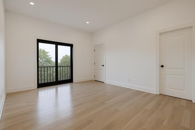 39 Rogers Ave, Somerville, MA 02144 - spare room featuring light wood finished floors and recessed lighting