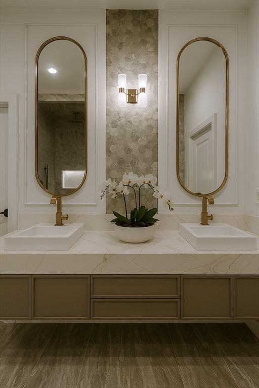 39 Rogers Ave, Somerville, MA 02144 - full bathroom featuring double vanity and wallpapered walls