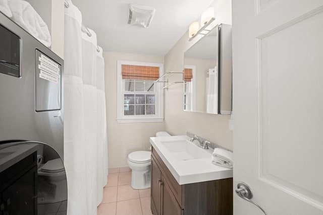 90 Broadway St Unit 90, Yarmouth, MA 02673 - bathroom featuring toilet, vanity, tile patterned flooring, and baseboards