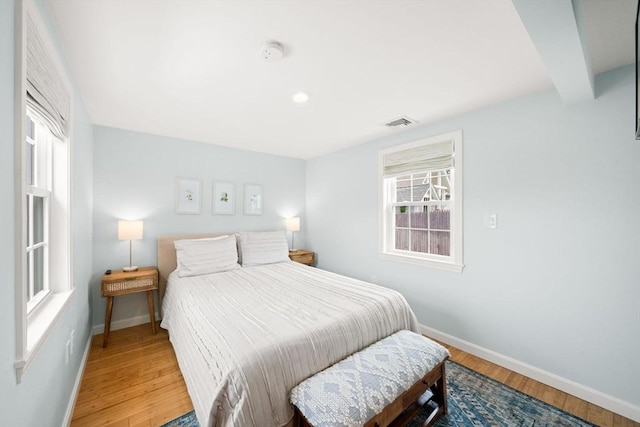 90 Broadway St Unit 90, Yarmouth, MA 02673 - bedroom with baseboards, light wood finished floors, multiple windows, and recessed lighting