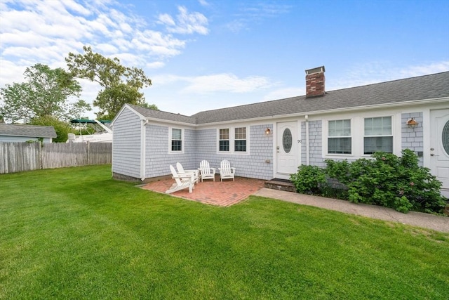 90 Broadway St Unit 90, Yarmouth, MA 02673 - back of house featuring a chimney and a patio area