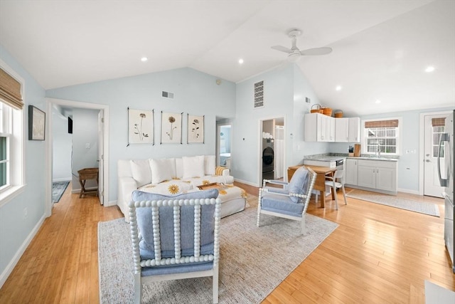 90 Broadway St Unit 90, Yarmouth, MA 02673 - living room with washer / clothes dryer, light wood-style flooring, ceiling fan, baseboards, and recessed lighting