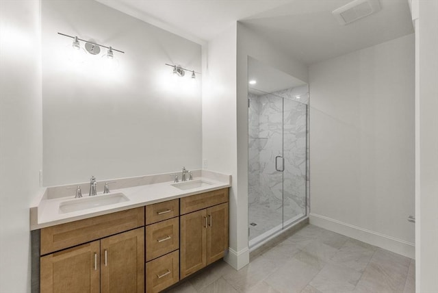 134 Court St Unit 2, Plymouth, MA 02360 - bathroom with a sink, baseboards, a marble finish shower, and marble finish floor