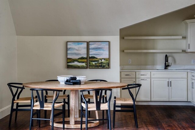 134 Court St Unit 2, Plymouth, MA 02360 - dining area featuring baseboards, vaulted ceiling, and dark wood finished floors