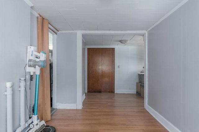 14 Sutton Ave, Oxford, MA 01540 - corridor with light wood-type flooring and baseboards