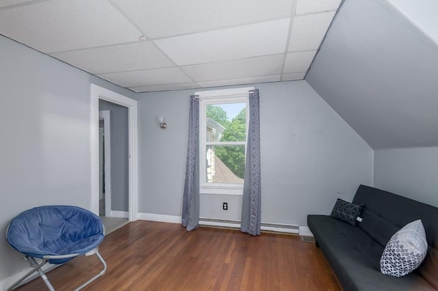 14 Sutton Ave, Oxford, MA 01540 - unfurnished room with wood finished floors, a drop ceiling, baseboards, and a baseboard radiator