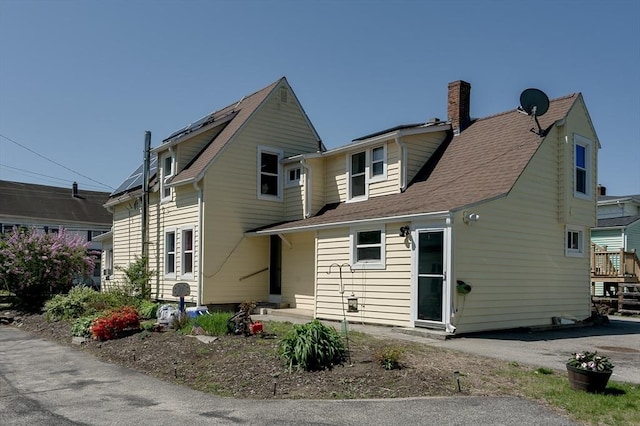 14 Sutton Ave, Oxford, MA 01540 - view of front facade featuring a chimney