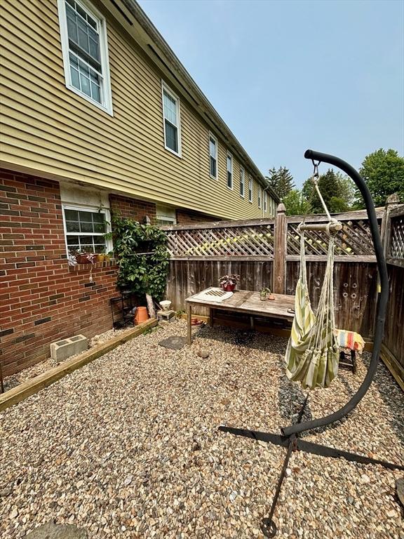 252 W St Unit 18, Amherst, MA 01002 - view of yard with a deck