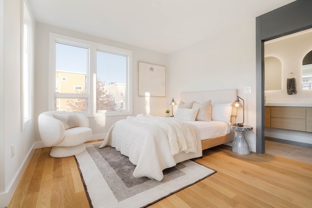 bedroom featuring light hardwood / wood-style flooring