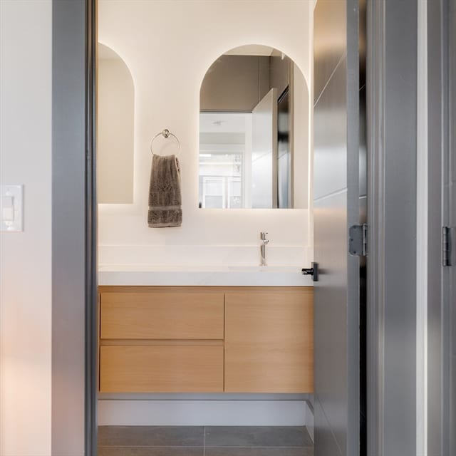 bathroom featuring vanity and tile patterned floors