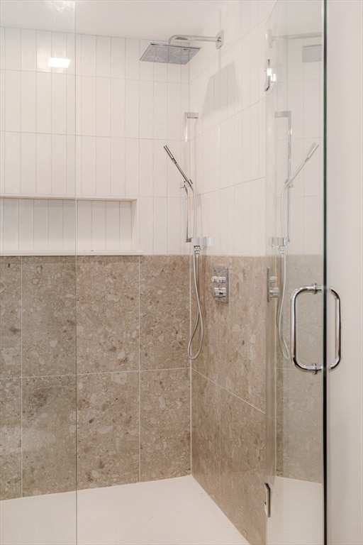 bathroom featuring walk in shower