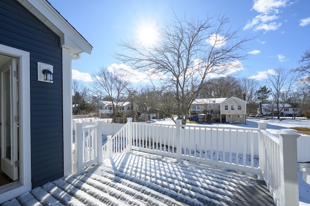 view of snow covered deck