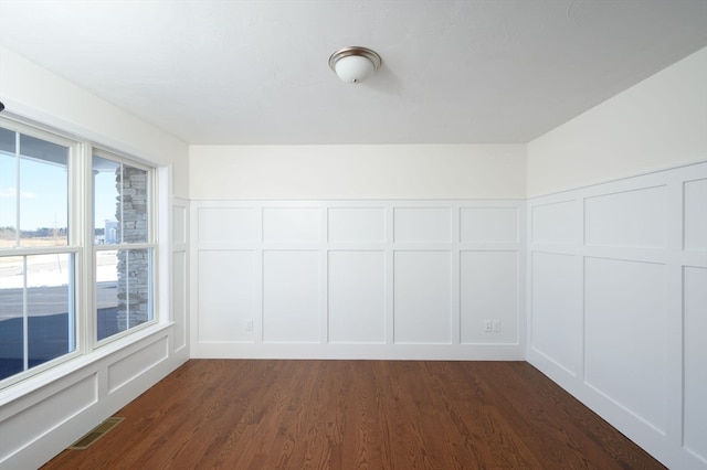 interior space with dark hardwood / wood-style floors