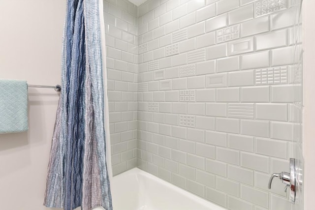 full bathroom with shower / tub combo