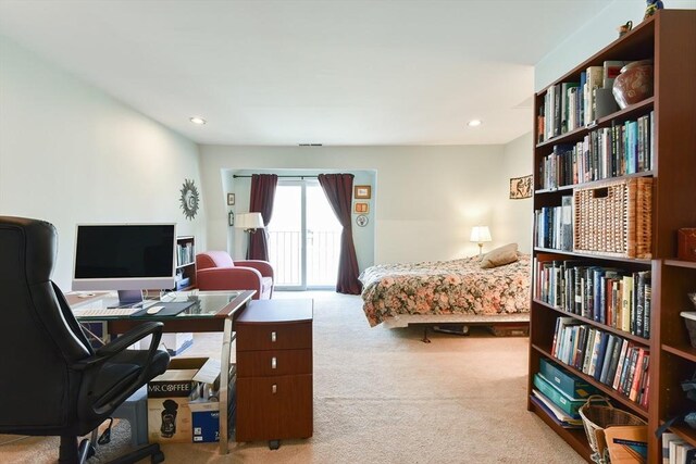 carpeted bedroom with access to outside and recessed lighting